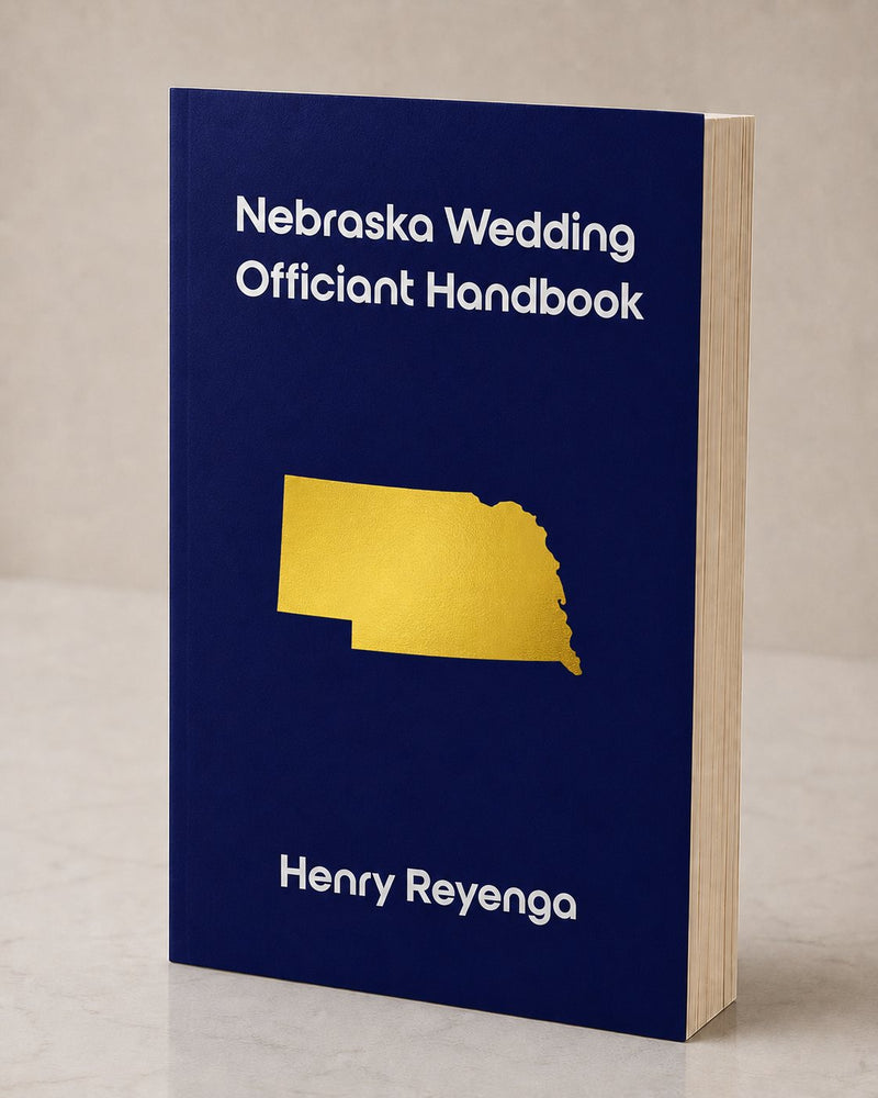 Book titled 'Nebraska Wedding Officiant Handbook' by Henry Reyenga on a beige background