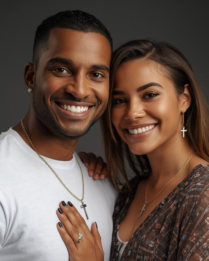 Man and woman smiling at the camera with a dark background